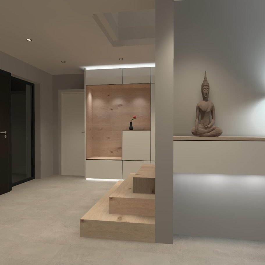 Moderner Eingangsbereich mit Buddha-Statue und Holztreppe, hell erleuchtet.